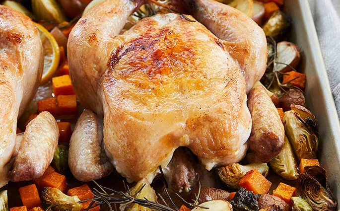 Brussels sprouts and garlic, marble potatoes, lemon, salt and black pepper, and premium Tyson® Family Roaster Whole Chicken