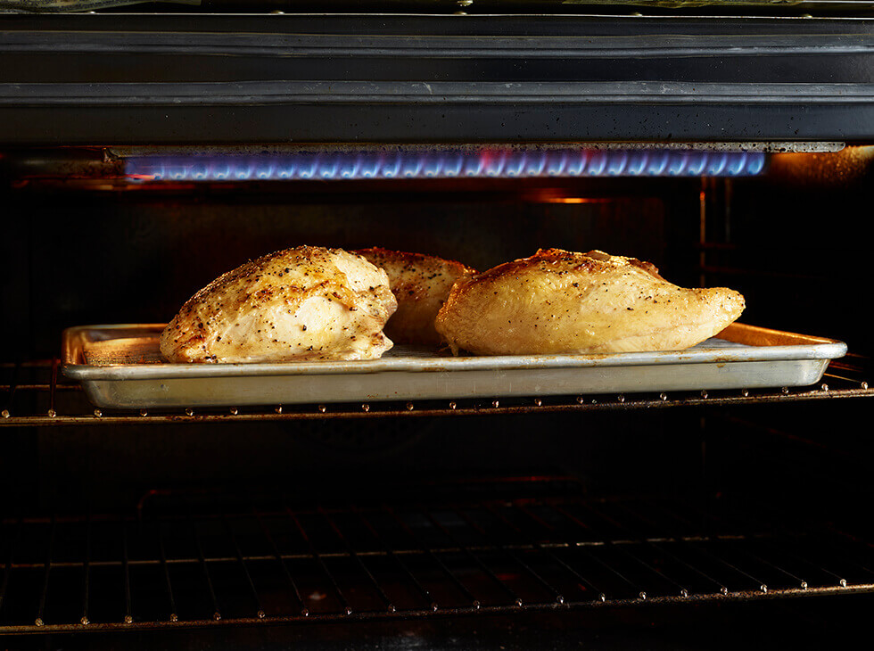 Broiling chicken in the oven on a metal cooking sheet